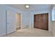 Light and airy bedroom with wood closet doors at 752 Tarry Town Trl, Port Orange, FL 32127