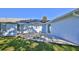 Back patio with brick pavers and partial view of yard at 752 Tarry Town Trl, Port Orange, FL 32127