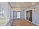 Bright screened porch with sliding glass doors at 752 Tarry Town Trl, Port Orange, FL 32127