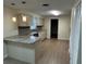 Modern kitchen featuring granite countertops and a breakfast bar at 795 Biro Dr, Port Orange, FL 32129