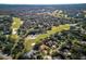 Aerial view showing home on golf course at 803 Silk Oak Ct, New Smyrna Beach, FL 32168