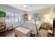 Main bedroom with a comfortable bed and window seating at 803 Silk Oak Ct, New Smyrna Beach, FL 32168