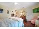 Main bedroom with ensuite and a cozy sitting area at 803 Silk Oak Ct, New Smyrna Beach, FL 32168