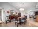 Bright dining room with wood table and chairs at 803 Silk Oak Ct, New Smyrna Beach, FL 32168