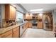 Updated kitchen featuring granite countertops and ample cabinet space at 803 Silk Oak Ct, New Smyrna Beach, FL 32168