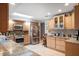 Spacious kitchen with granite countertops and lots of cabinet storage at 803 Silk Oak Ct, New Smyrna Beach, FL 32168