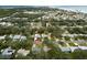 Aerial view showing a single Gathering home and neighborhood at 810 E 9Th Ave, New Smyrna Beach, FL 32169