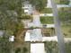 Aerial view showcasing a single Gathering home and surrounding neighborhood at 810 E 9Th Ave, New Smyrna Beach, FL 32169