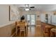 Kitchen dining area with wood table and access to backyard at 810 E 9Th Ave, New Smyrna Beach, FL 32169