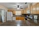 Bright kitchen with granite countertops and light wood cabinets at 810 E 9Th Ave, New Smyrna Beach, FL 32169