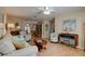 Open living room with hardwood floors and a view into the dining area at 810 E 9Th Ave, New Smyrna Beach, FL 32169