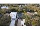 Aerial view showing a house, pool and surrounding houses at 814 E 20Th Ave, New Smyrna Beach, FL 32169