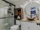 Modern bathroom with subway tile, a walk-in shower, and a copper sink at 814 E 20Th Ave, New Smyrna Beach, FL 32169