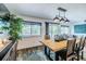 Rustic dining table in open concept living space at 814 E 20Th Ave, New Smyrna Beach, FL 32169