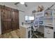 Bright home office featuring a standing desk and dual monitors at 814 E 20Th Ave, New Smyrna Beach, FL 32169