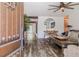 Bright living room with hardwood floors, comfortable seating, and a rustic coffee table at 814 E 20Th Ave, New Smyrna Beach, FL 32169