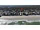 Property location shown in an aerial view near the beach at 826 E 12Th Ave, New Smyrna Beach, FL 32169