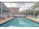 Inviting screened pool with ample deck space for relaxation at 826 E 12Th Ave, New Smyrna Beach, FL 32169