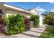 Rear view of house showing AC unit and side yard at 831 Evergreen St, New Smyrna Beach, FL 32169