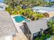 Aerial view showing pool, spa, and backyard at 831 Evergreen St, New Smyrna Beach, FL 32169