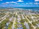 Aerial view of the house and surrounding neighborhood at 831 Evergreen St, New Smyrna Beach, FL 32169