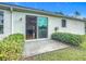 Sliding glass doors leading to a backyard patio at 997 Sugar Mill Dr, New Smyrna Beach, FL 32168