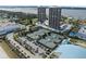 Aerial view of condo complex tennis courts and parking at 1 Oceans West Blvd # 5A3, Daytona Beach, FL 32118