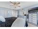 Spacious bedroom with dresser and large TV at 1 Oceans West Blvd # 5A3, Daytona Beach, FL 32118