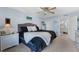 Bright bedroom with large bed and ensuite bathroom at 1 Oceans West Blvd # 5A3, Daytona Beach, FL 32118