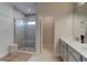 Primary bathroom with double vanity and a walk-in shower at 1002 Chelan Falls Dr, Deland, FL 32724