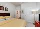 Bright bedroom with double bed and access to hallway at 1002 Chelan Falls Dr, Deland, FL 32724