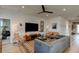 Mid-century modern living room with hardwood floors at 1002 Chelan Falls Dr, Deland, FL 32724