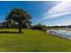 Landscaped grounds with lake view at 1036 Bonaire Dr # 2832, Altamonte Springs, FL 32714