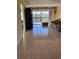 Living room with tile floors and access to balcony at 1036 Bonaire Dr # 2832, Altamonte Springs, FL 32714