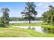 Scenic waterfront view with lush greenery and wildlife at 1036 Bonaire Dr # 2832, Altamonte Springs, FL 32714