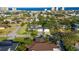 Aerial view showing home, pool, and neighborhood near the ocean at 12 Foster Dr, Daytona Beach, FL 32118