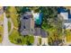 Aerial view of a single-Gathering home with pool and detached garage at 12 Foster Dr, Daytona Beach, FL 32118