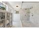 Spa-like bathroom with marble shower and separate vanity area at 12 Foster Dr, Daytona Beach, FL 32118