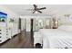 Bright bedroom with hardwood floors, white furniture, and large windows at 12 Foster Dr, Daytona Beach, FL 32118