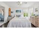 Bedroom with a double bed, dresser, and beach-themed decor at 12 Foster Dr, Daytona Beach, FL 32118