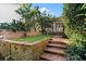 Brick steps and retaining wall lead to patio at 12 Foster Dr, Daytona Beach, FL 32118