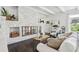 White stone fireplace in living room with dark hardwood floors at 12 Foster Dr, Daytona Beach, FL 32118