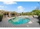 Inviting kidney-shaped pool with a large wooden deck at 12 Foster Dr, Daytona Beach, FL 32118