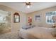 Bright bedroom with tiled floors and ceiling fan at 1207 Magnolia St, New Smyrna Beach, FL 32168