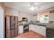 Updated kitchen, featuring stainless steel appliances and ample cabinet space at 1207 Magnolia St, New Smyrna Beach, FL 32168