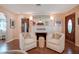 Living room with fireplace and hardwood floors at 1207 Magnolia St, New Smyrna Beach, FL 32168