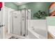 Clean bathroom with a large walk in shower and a separate tub at 121 Sedona Cir, Daytona Beach, FL 32124