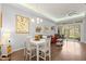 Casual dining area with white table and chairs, near kitchen at 121 Sedona Cir, Daytona Beach, FL 32124