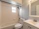 Bathroom with white vanity, shower and bathtub at 1210 Washington St, New Smyrna Beach, FL 32168