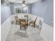 Small dining area with glass table and four chairs at 1253 Harbour Point Dr, Port Orange, FL 32127